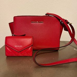 Red Michael Kors Crossbody approximately 9x7x3 with 6 card slot wallet